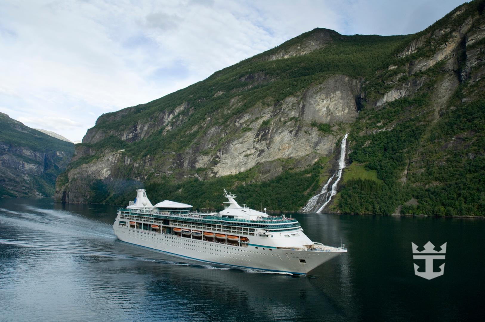 Vision of the Seas exterior near a glacial inlet